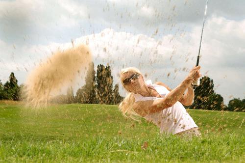 Golf vrouw